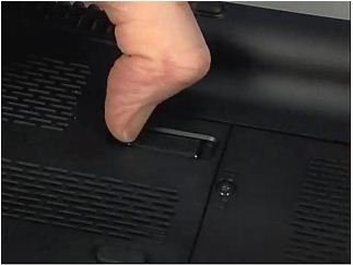 我的笔记本电脑是惠普康柏CQ35系列，请问电脑后面的电池盖板如何打开？