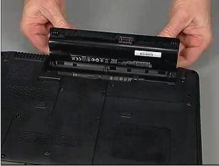 我的笔记本电脑是惠普康柏CQ35系列，请问电脑后面的电池盖板如何打开？