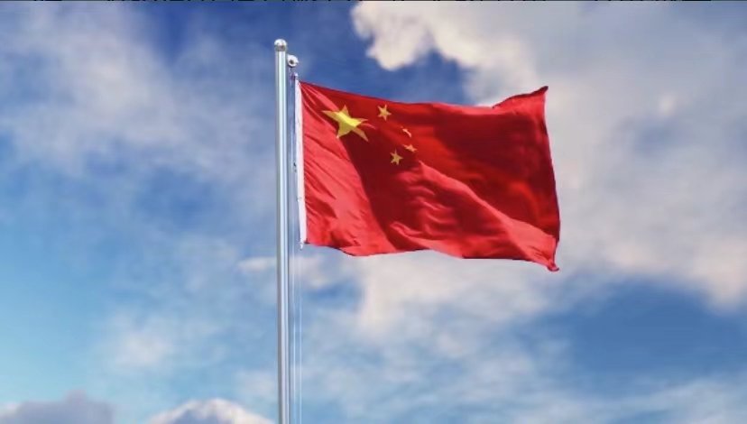 长在红旗下走在春风里出自?