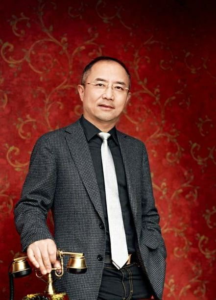 重大校友唐立新是谁?